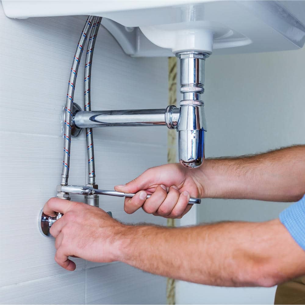 Plumber fixing water line